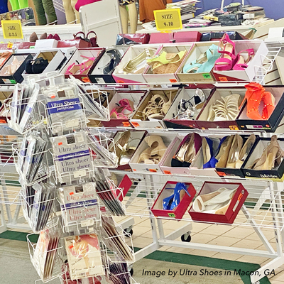 Double Sided Merchandiser Display Rack With 12 Shelves  3" Casters